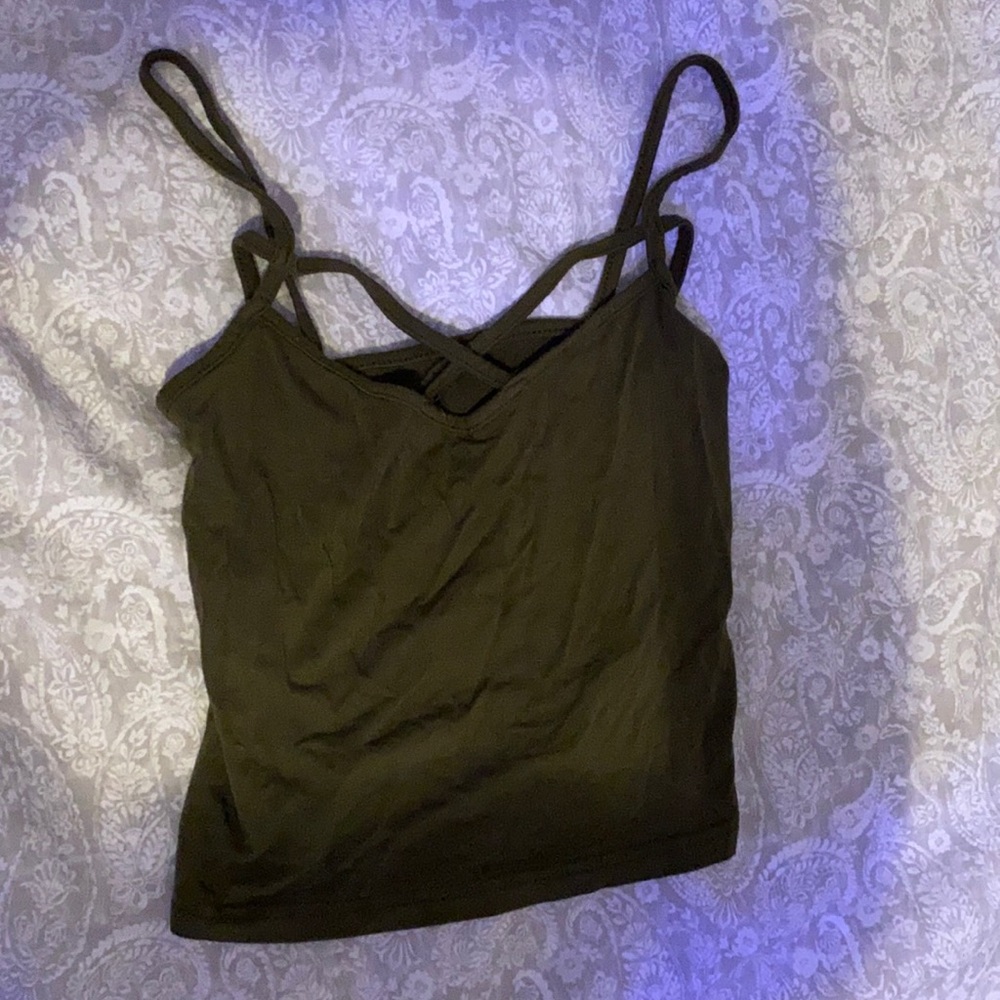 a green crossed tank top.